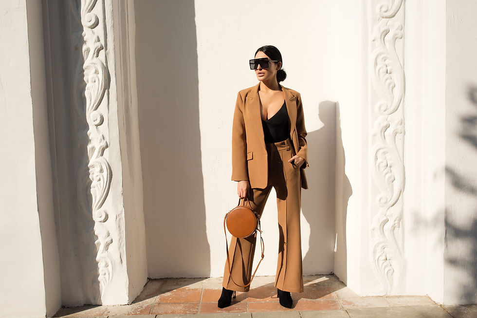 Woman in Camel Suit